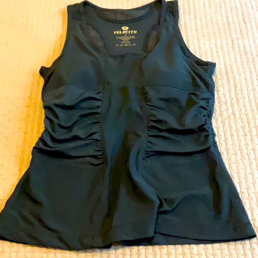 Velocity workout tank with flattering ruching, mesh panels and built-in bra